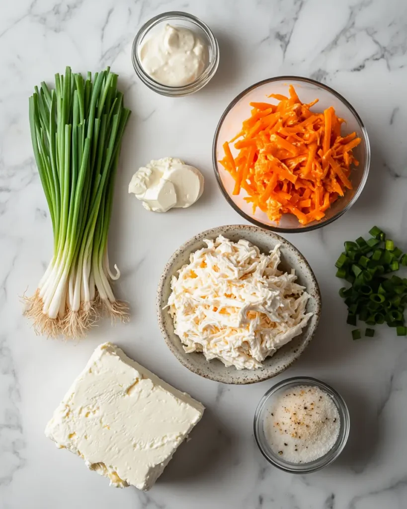 u6472731739 Cream cheese block shredded chicken in a bowl buf 517319e5 c9a0 48ec 9e79 ea2a0fc3497f 0 Cheesy Creamy Buffalo Chicken Dip : The Game day Favorite