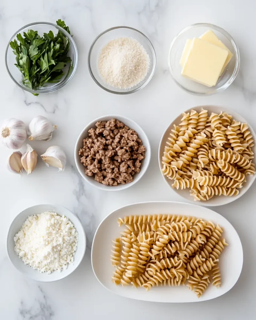 u6472731739 flat lay of rotini pasta garlic cloves ground bee 538c75df 783f 4e95 b576 bc58e5dd9e53 3 Family Dinner Recipe: Beef and Rotini in Garlic Parmesan Sauce