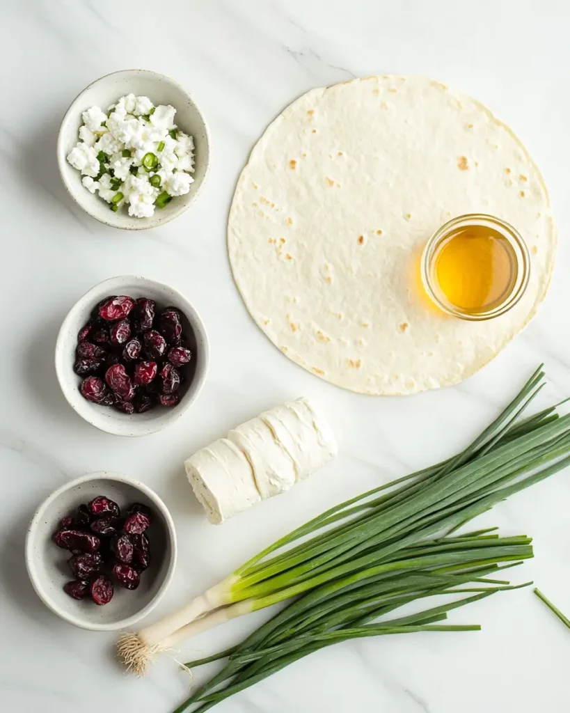 u6472731739 Ingredients for Cranberry Feta Pinwheels tortilla fb9013da 8b62 43d8 bb53 2a515ef242dd 1 Cranberry Feta Pinwheel